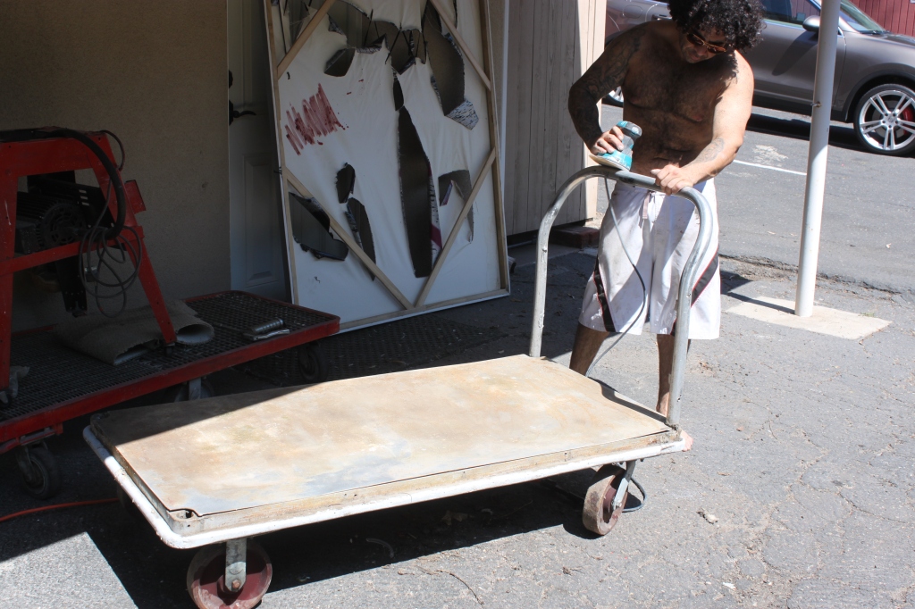 Aaron R. Thomas working on vintage cart